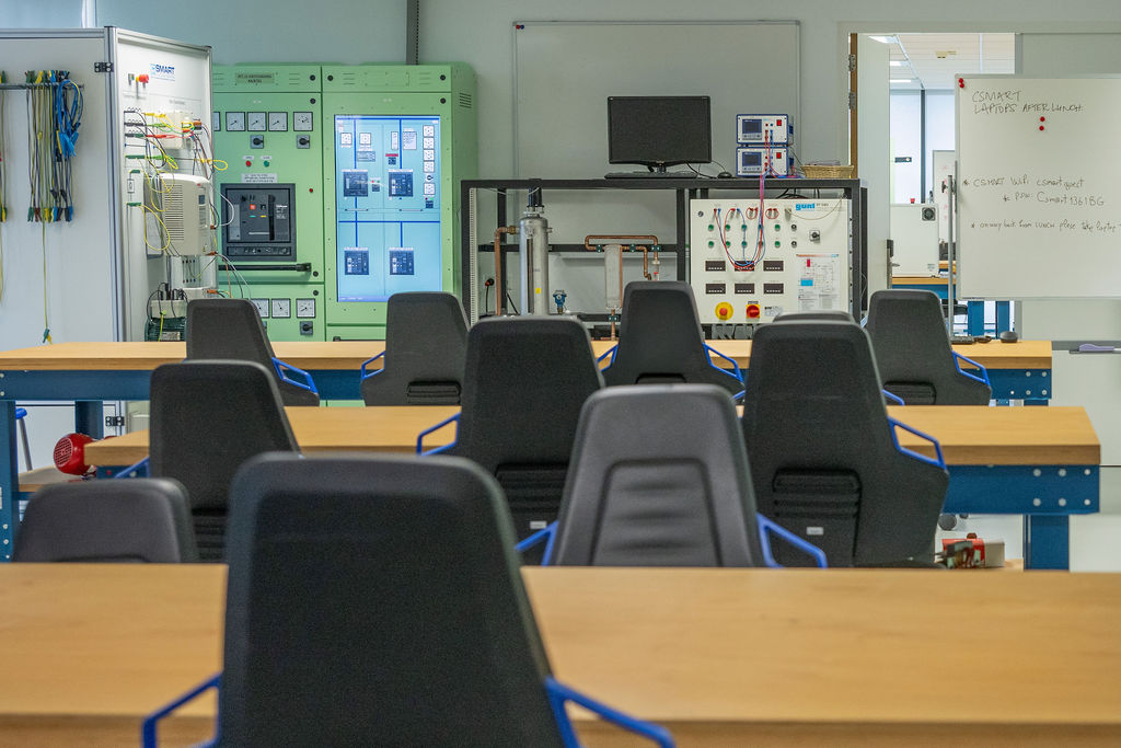 Electrical workshop with switchgear training panels and workbenches